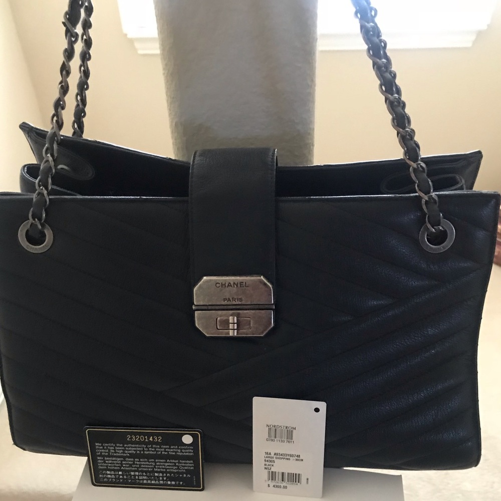 Authentic Chanel handbag brand new been carried 4 or 5 times. (Price drop)